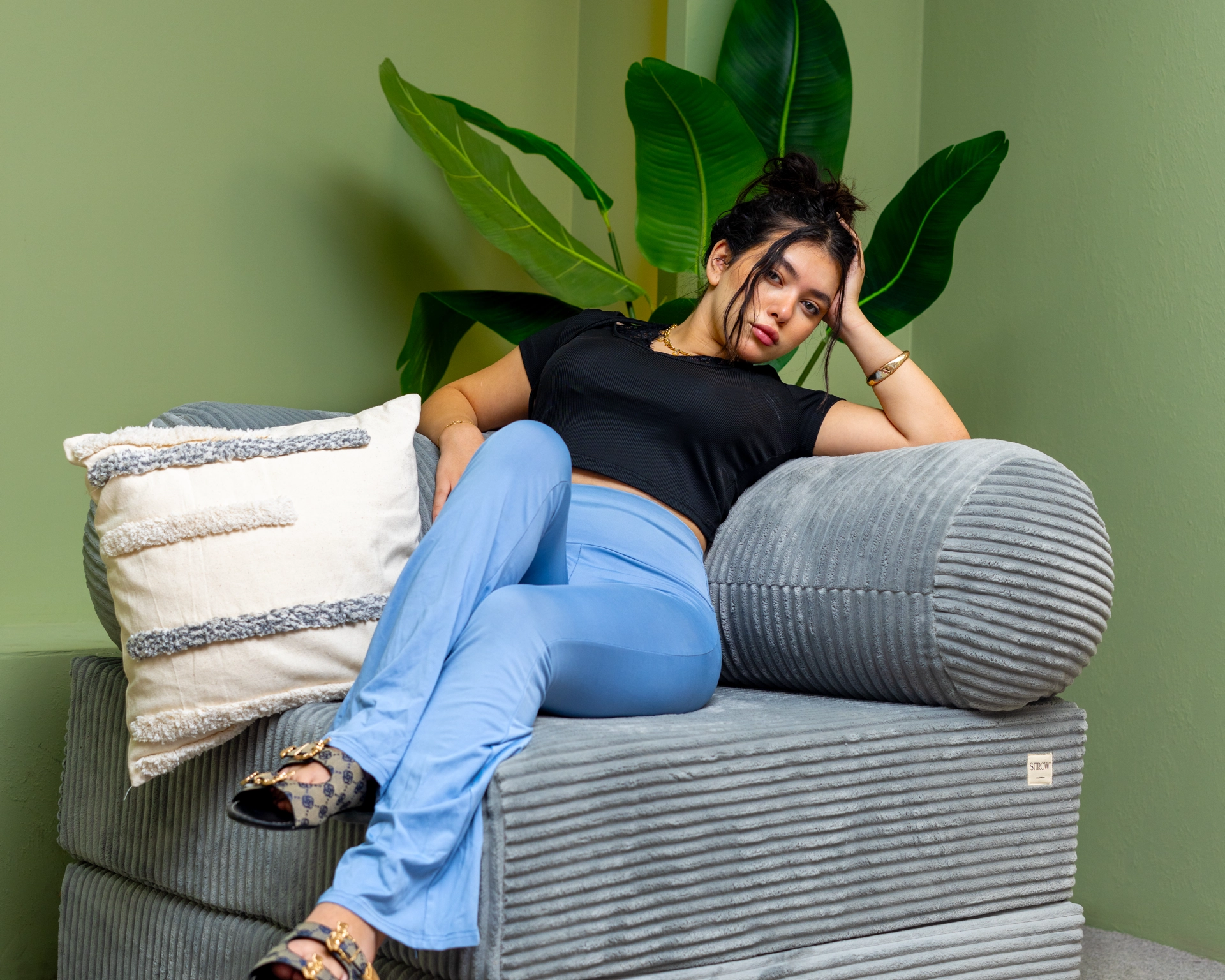 An elegant white sofa by Sitrow in a modern living room